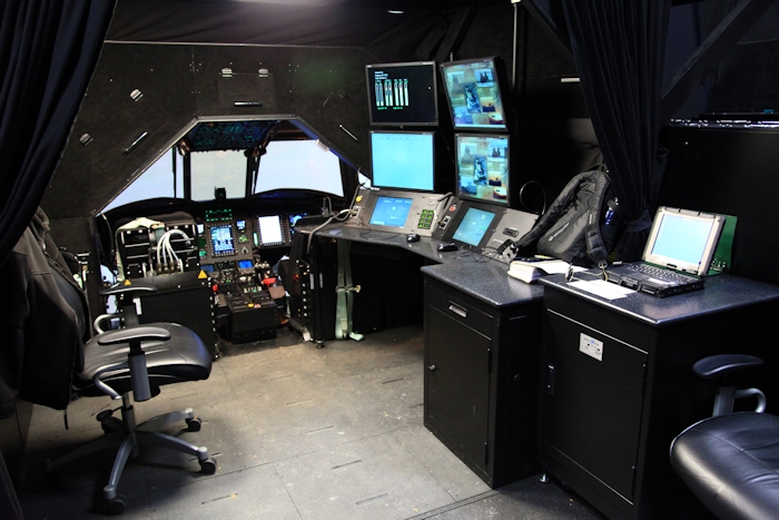 The instructor console of the CH-47F simulator.  From this station, the Instructor Pilot could input many different scenerios allowing the student pilot to learn to operate the aircraft without ever leaving the ground. The simulator was approximately 95 percent as real as flying the actual aircraft.