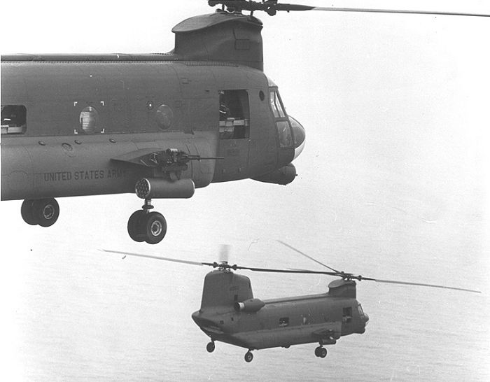 A pair of Guns-A-Go-Go Chinooks flying formation, date and location unknown.