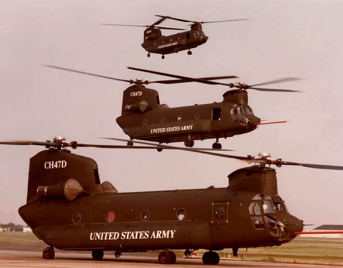 The three prototype D model Chinook helicopters pose for a group photograph at the Boeing plant.