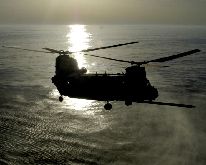 27 April 2006: An MH-47 Chinook helicopter from the 160th Special Operations Aviation Regiment approaches the amphibious assault ship USS Wasp off the coast of Virginia during deck landing qualifications.