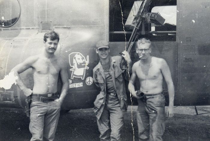 Jack Label, Don Ross, and Tom Doyle stand next to Chinook 66-19023 while at Cu Chi, Republic of Vietnam, early 1969.