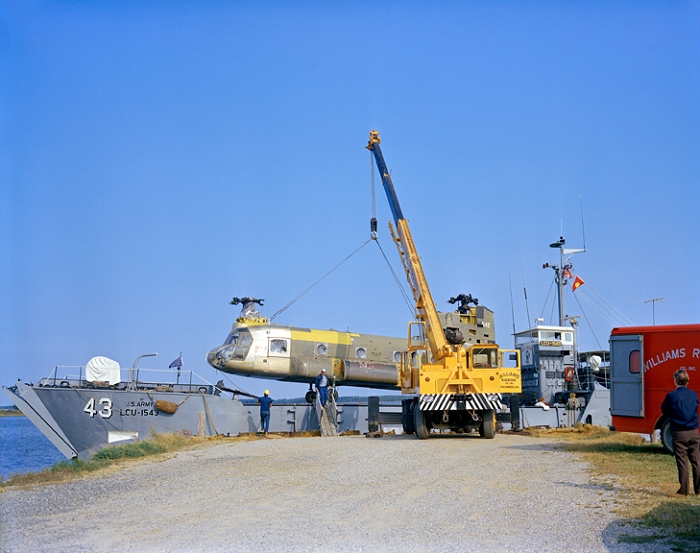 1973: A crane offloads CH-47C Chinook helicopter 67-18542 from a barge. The aircraft was transported from Fort Eustis, Virgina, and was destined for destruction as part of the crash testing conducted in support of the U.S. Army by the National Aeronautics and Space Administration (NASA).