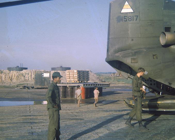 Door Gunner SP4 Cochran (Left) and SP5 Robert Granatire 68-15817's Flight Engineer are shown above.