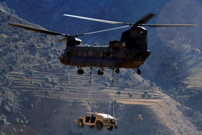 30 November 2008: 86-01650, a CH-47D Chinook helicopter, airlifts a HUMVEE via sling load at a forward operating base (FOB) near Bostick in Afghanistan.