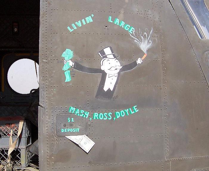 A photograph of the nose art on 90-00211, a.k.a. "Livin' Large" - 11 October 2003, taken in Kirkuk, Iraq.