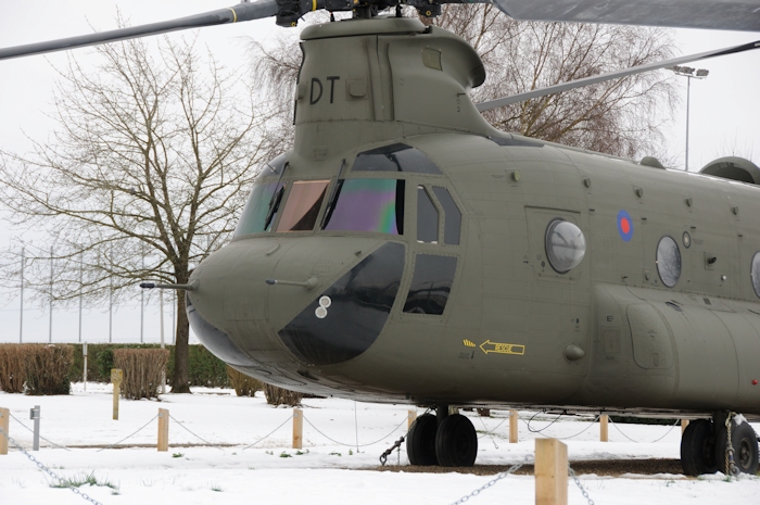 25 January 2013: In a photograph provided by Mike Hopwood CH-47F (minus) Chinook helicopter 03-08003 is seen in Royal Air Force livery standing guard at the gate of RAF Odiham, England, on permanent static display.