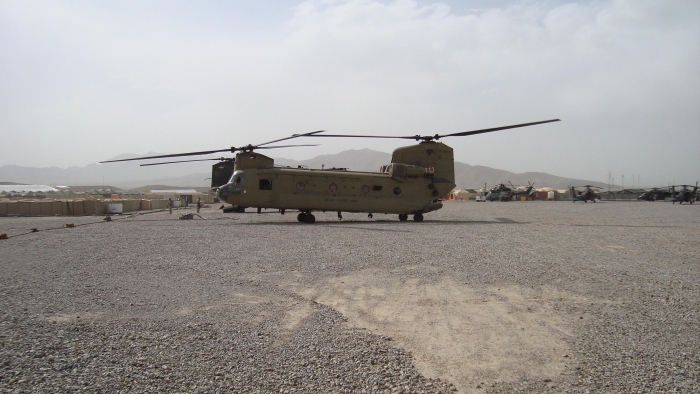 Early 2009: CH-47F Chinook helicopter 04-08702 sitting in a Forward Area Refueling Point (FARP) somewhere in Afghanistan.
