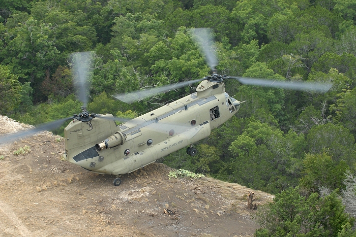 26 August 2010: Hovering with only the rear wheels touching the edge of a cliff, pilots from Company B - "Blackcats", 2nd General Support Aviation Battalion, 227th Aviation Regiment, 1st Air Cavalry Brigade, 1st Cavalry Division, Fort Hood, Texas, perform a maneuver called a pinnacle landing in CH-47F Chinook helicopter 07-08036 during a training flight. The pinnacle allows the pilots to drop off ground forces in areas too dangerous or too difficult to fully complete a landing.