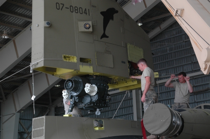 April 2009: CH-47F Chinook helicopter 07-08041 gets the aft pylon reinstalled after being transported to Afghanistan.