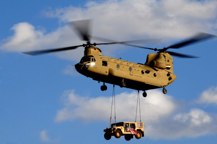4 March 2010: U.S. Army CH-47 Chinook helicopter 07-08722 transporting a Humvee prepares to land at a forward operating base in southern Afghanistan. The Chinook is the Army's primary cargo aircraft and has been crucial throughout Operation Enduring Freedom.