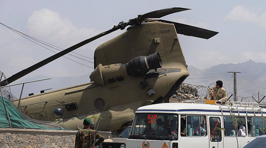 26 July 2010: Afghan National Army (ANA) soldiers stand guard alongside International Security Assistance Force (ISAF) CH-47F Chinook helicopter 08-08048 which crashed in an eastern district of Kabul yesterday. The aircraft made a hard landing along the perimeter of a coalition force camp in Kabul province. Four passengers received minor injuries. The cause of the crash is under investigation.