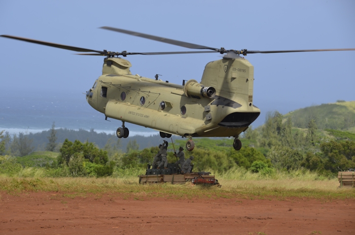 22 January 2014: Aircrews from B Company - "Hillclimbers", 3rd Battalion, 25th Combat Aviation Brigade utilize Chinook helicopter 09-08785 to sling load construction materials for soldiers assigned to the 643rd Engineer Company, 84th Engineer Battalion, 130th Engineer Brigade, 8th Theater Sustainment, in remote areas throughout the Kahuku Training Area in support of the 25th Infantry Divisions Jungle Operations Training Center.