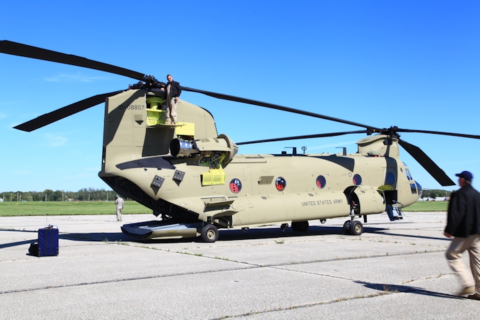 19 September 2012: CH-47F Chinook helicopter 10-08807 receiving a post-flight inspection from Flight Engineer Bruce Cain at Gus Grissom Joint Civil/Miltary Air Reserve Base (KGUS).