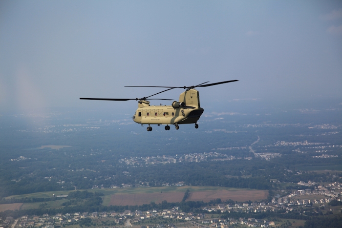 11 September 2013: CH-47F Chinook helicopter 11-08834 airborne and enroute to the Port of Baltimore for ship transport to the Republic of Korea.