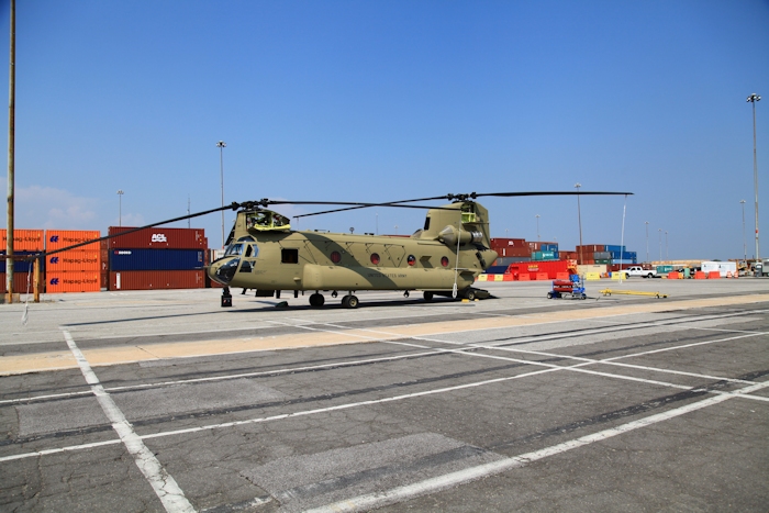 11 September 2013: CH-47F Chinook helicopter 11-08838 sits on the dock at the Port of Baltimore awaiting rotor blade removal and preparation for ship transport to the Republic of Korea.