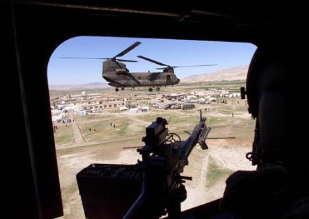 Two U.S. Army CH-47 Chinook helicopters take off over earthquake hit Nahrin, in Afghanistan.