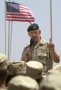General Tommy Franks speaks to U.S. troops at the U.S. base in Kandahar, Afghanistan, on Wednesday, 15 May 2002. Franks was paying a one-day visit to Afghanistan to the several thousand American troops stationed in the country.