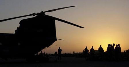 82nd Airborne Division soldiers prepare to board a CH-47D Chinook helicopter.