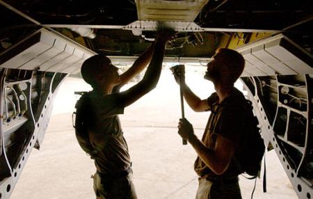 Repairing a Chinook in Afghanistan.