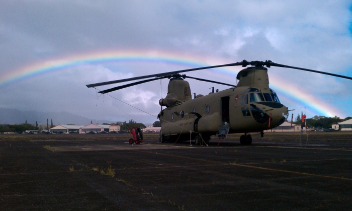 December 2010: A brand new CH-47F Chinook helicopter sits on the ramp at Wheeler Army Airfield (PHHI), Oahu, Hawaii, under the glow of a rainbow.