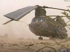 A U.S. Army CH-47D Chinook, stranded by an RPG incident. One of four helicopters invloved and valued at approximately 20 million US dollars each.