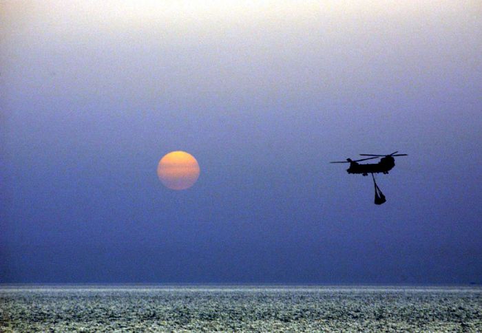 A British Royal Air Force Chinook helicopter, from 18 Squadron, flys over the northern Arabian Gulf.