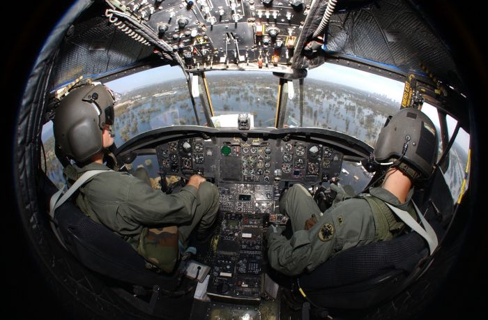 7 September 2005: U.S. Army National Guard Warrant Officers Charles Woodward and Lance Brennan, pilots of a CH-47D Chinook assigned to the 131st Aviation Regiment of the Georgia National Guard, fly over areas that were flooded when Hurricane Katrina devastated parts of New Orleans, La. The humanitarian assistance operations is a joint effort led by the Department of Defense in conjunction with the Federal Emergency Management Agency (FEMA).