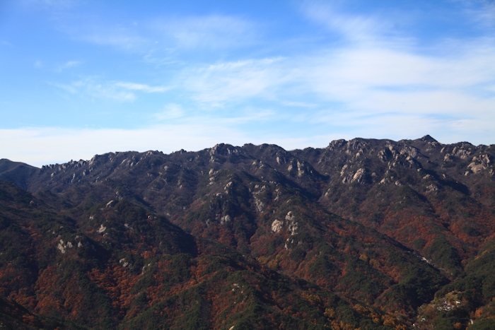 8 November 2013: Continuing north from Busan enroute to Camp Humphreys the flight encountered some scenic mountains with beautiful fall foilage.