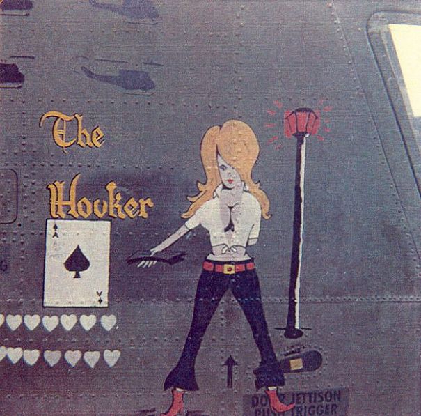 The nose art of 66-00095 post April 1968. The original nose art designed by SP4 Larry Dumford displayed the young lady without a blouse and the Ace of Spades was added by someone after April 1968.