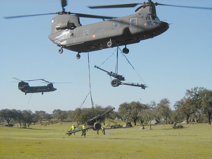 Two Spanish Chinooks transport Howitzers while on exercise with the Portuguese Army in November 2003.