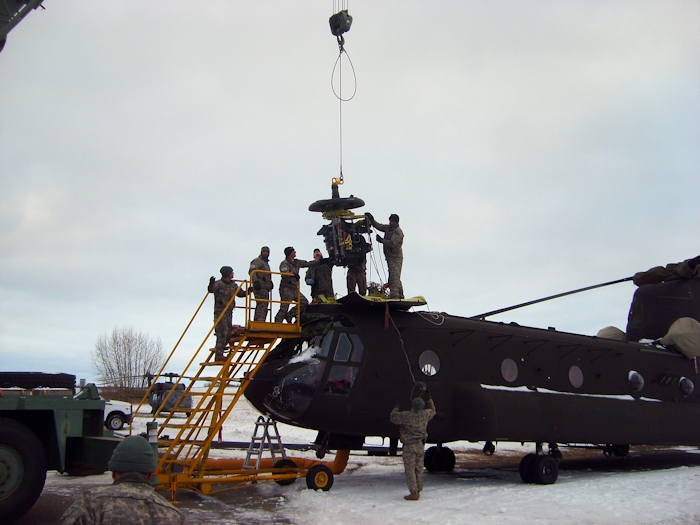 24 October 2012: Colorado Army National Guard members replace a defective transmission in a CH-47D Chinook helicopter in below-freezing temperatures during operation Maple Resolve at the Canadian Manoeuver Training Center in Wainwright, Alberta.
