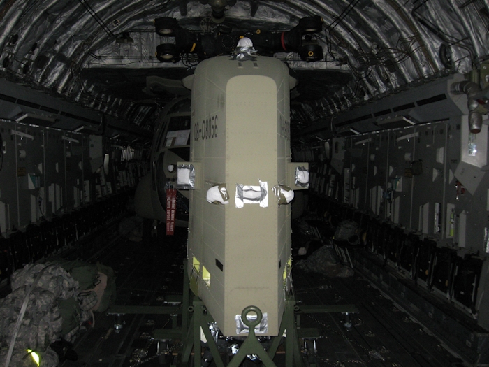Somewhere over the Altantic Ocean, 08-08056 is loaded aboard a C-17 Globemaster III headed for Afghanistan.